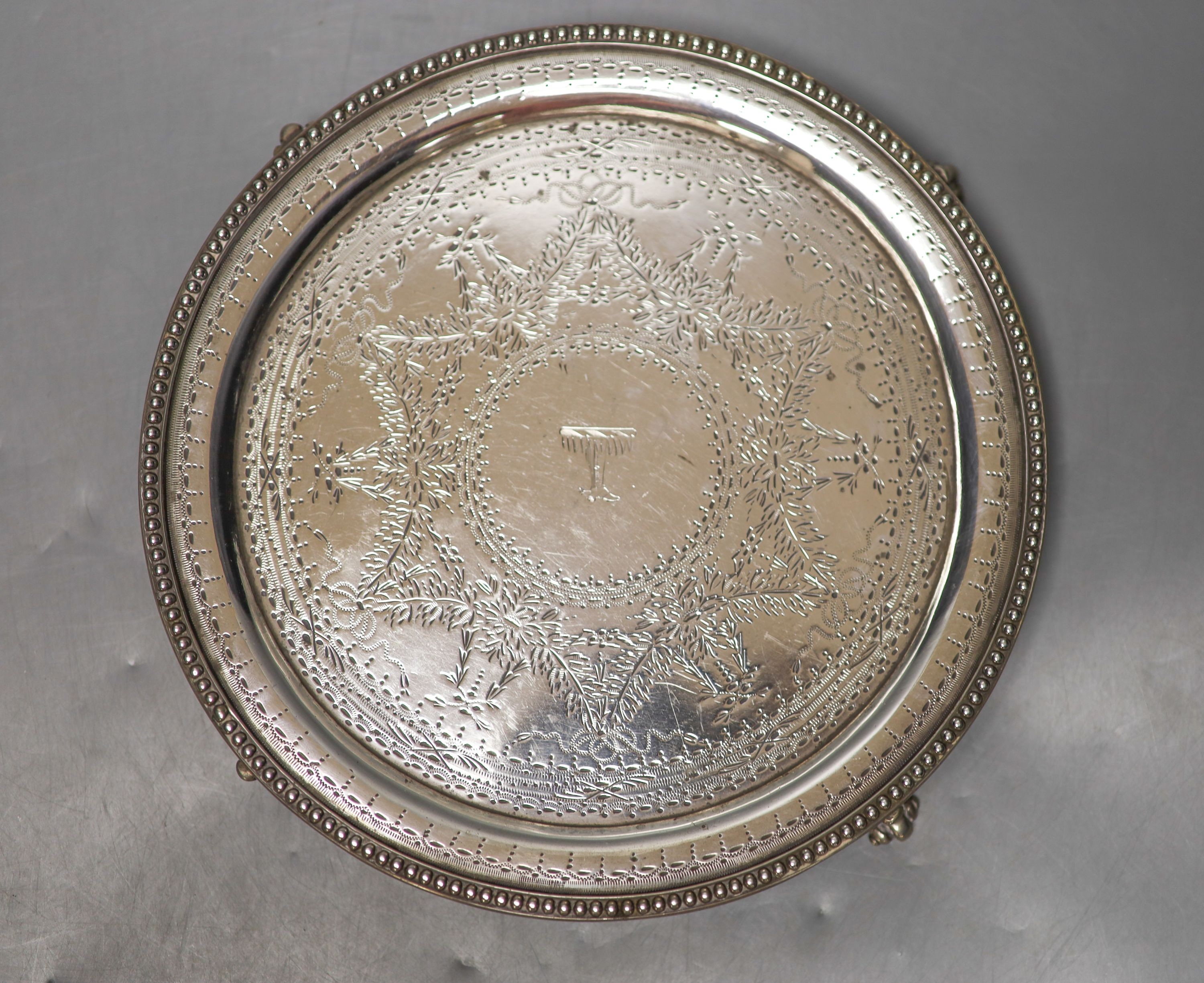 A Victorian circular engraved silver waiter, Daniel & Charles Houle, London, 1867, 20.7cm, 12.5oz.